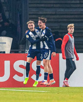 Soccer, Men, Season 2025 2026, DFB Cup Round of 16 , Hertha BSC 1 FC Kaiserslautern, f l Marten Winkler Hertha BSC , Kennet Eichhorn Hertha BSC , Cheering after scoring 3 0, 02 12 2025, Copyright: xSebastianxRäppold MatthiasxKochx