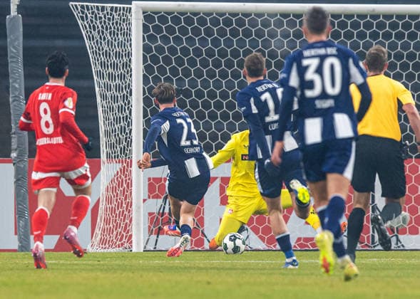 Soccer, Men, Season 2025 2026, DFB Pokal Round of 16 , Hertha BSC 1 FC Kaiserslautern, Kennet Eichhorn Hertha BSC scores the goal for 3 0 against goalkeeper Simon Simoni Kaiserslautern , 02 12 2025, Copyright: xSebastianxRäppold MatthiasxKochx