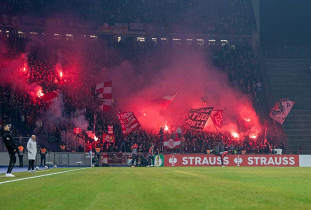 Soccer, Men, Season 2025 2026, DFB Cup round of 16, Hertha BSC 1 FC Kaiserslautern, Fans of Kaiserlautern ignite pyrotechnics in the guest block, 02 12 2025, Copyright: xSebastianxRäppold MatthiasxKochx