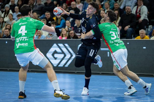FLENSBURG, GERMANY - DECEMBER 2: Marko Grgic (SG Flensburg-Handewitt, 17) against Marko Jevtic (IRUDEK Bidasoa Irun, 04) and Gorka Nieto Marcos (IRUDEK Bidasoa Irun, 31) during the EHF European League match between SG Flensburg-Handewitt vs IRUDEK Bidasoa Irun at GP JOULE Arena on matchday 1 of the Group Matches Group A on December 2, 2025 in Flensburg, Germany. Schleswig-Holstein Germany Copyright: xBEAUTIFULxSPORTS MarioxM.xKobergx