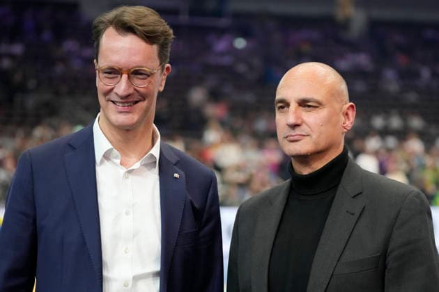 Hendrik Josef Wüst (Ministerpräsident des Landes Nordrhein-Westfalen) und Alexander Kalouti (Oberbürgermeister der Stadt Dortmund) looks on during the 27th IHF Women s Handball World Championship, WM, Weltmeisterschaft - Main Round match between Germany and Faroe Islands at Westfalenhalle on December 2, 2025 in Dortmund, Germany. (Photo by Alex Gottschalk DeFodi Images)