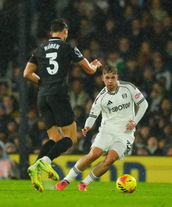 Emile Smith Rowe of Fulham and Ruben Dias of Manchester City Fulham v Manchester City, Premier League, Football, Craven Cottage, London, UK - 02 Dec 2025London Craven Cottage United Kingdom EDITORIAL USE ONLY No use with unauthorised audio, video, data, fixture lists, club league logos or live services. Online in-match use limited to 120 images, no video emulation. No use in betting, games or single club league player publications.  Copyright: xJavierxGarcia Shutterstockx 16005566al
