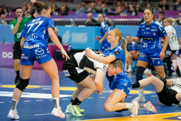 Jana Mittun Faroe Islands , Lisa Antl Germany and Liv Zachariasen Faroe Islands battle for the ball during the 27th IHF Women s Handball World Championship Main Round match between Germany and Faroe Islands at Westfalenhalle on December 2, 2025 in Dortmund, Germany Photo by Alex Gottschalk DeFodi Images