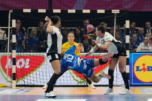 Suna Hansen Faroe Islands and Emily Vogel Germany battle for the ball during the 27th IHF Women s Handball World Championship Main Round match between Germany and Faroe Islands at Westfalenhalle on December 2, 2025 in Dortmund, Germany Photo by Alex Gottschalk DeFodi Images