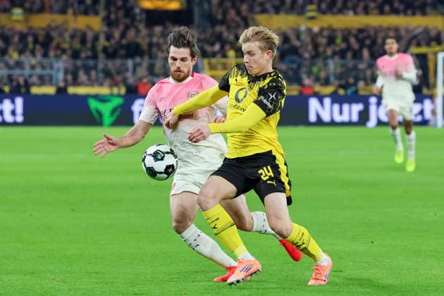 Jonas Hofmann Bayer 04 Leverkusen and Daniel Svensson Borussia Dortmund battle for the ball, DFB Pokal, Borussia Dortmund v Bayer 04 Leverkusen, Signal Iduna Park, December 2, 2025 in Dortmund, Germany Photo by Marco Steinbrenner DeFodi Images Jonas Hofmann Bayer 04 Leverkusen and Daniel Svensson Borussia Dortmund battle for the ball, DFB Pokal, Borussia Dortmund v Bayer 04 Leverkusen, Signal Iduna Park, December 2, 2025 in Dortmund, Germany Photo by Marco Steinbrenner DeFodi Images DFB DFL REGULATIONS PROHIBIT ANY USE OF PHOTOGRAPHS AS IMAGE SEQUENCES AND OR QUASI VIDEO