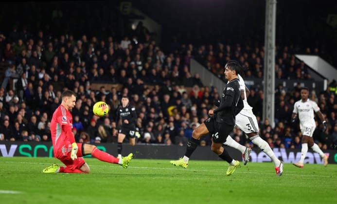 London, England, 2nd December 2025. Tijjani Reijnders of Manchester City scores their second goal during the Fulham vs Manchester City Premier League match at Craven Cottage, London. Picture credit should read: Nigel Roddis Sportimage EDITORIAL USE ONLY. No use with unauthorised audio, video, data, fixture lists, club league logos or live services. Online in-match use limited to 120 images, no video emulation. No use in betting, games or single club league player publications. SPI_026_PT_Fulham_Man_City SPI-4339-0026