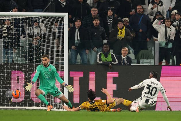 Turin, Italy, 2nd December 2025. Jonathan David of Juventus scores to give the side a 1-0 lead during the Juventus vs Udinese Coppa Italia match at Allianz Stadium, Turin. Picture credit should read: Jonathan Moscrop Sportimage EDITORIAL USE ONLY. No use with unauthorised audio, video, data, fixture lists, club league logos or live services. Online in-match use limited to 120 images, no video emulation. No use in betting, games or single club league player publications. SPI_022_JM_JUVE_UDINESE_CI SPI-4319-0022