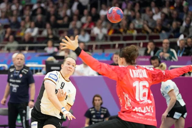 Lisa Antl Germany and goalkeeper Gylta A Neystabo Faroe Islands battle for the ball during the 27th IHF Women s Handball World Championship Main Round match between Germany and Faroe Islands at Westfalenhalle on December 2, 2025 in Dortmund, Germany Photo by Alex Gottschalk DeFodi Images