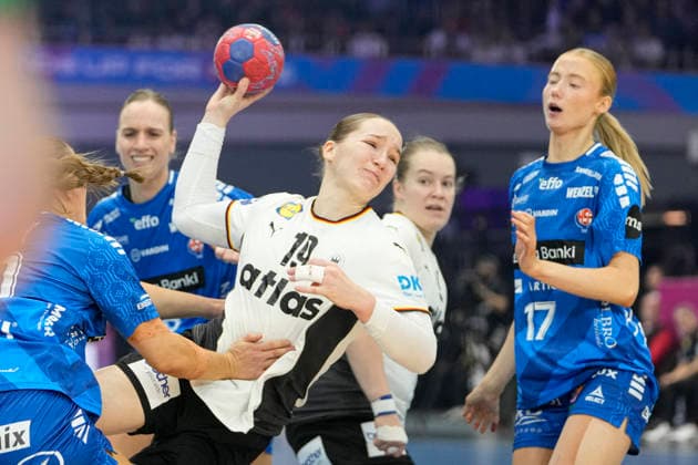 Suna Hansen Faroe Islands and Nieke Kühne Germany battle for the ball during the 27th IHF Women s Handball World Championship Main Round match between Germany and Faroe Islands at Westfalenhalle on December 2, 2025 in Dortmund, Germany Photo by Alex Gottschalk DeFodi Images