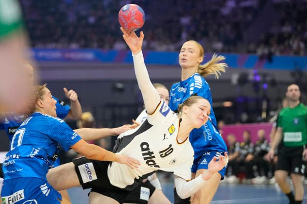 Suna Hansen Faroe Islands and Nieke Kühne Germany battle for the ball during the 27th IHF Women s Handball World Championship Main Round match between Germany and Faroe Islands at Westfalenhalle on December 2, 2025 in Dortmund, Germany Photo by Alex Gottschalk DeFodi Images