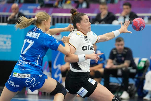 Liv Zachariasen Faroe Islands and Emily Vogel Germany battle for the ball during the 27th IHF Women s Handball World Championship Main Round match between Germany and Faroe Islands at Westfalenhalle on December 2, 2025 in Dortmund, Germany Photo by Alex Gottschalk DeFodi Images