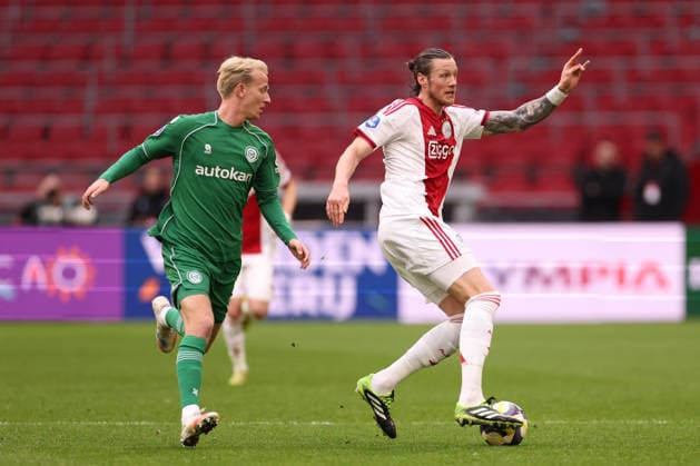 Wout Weghorst of AFC Ajax with Thijmen Blokzijl of FC Groningen during the match AFC Ajax Amsterdam vs FC Groningen at the Johan Cruijff ArenA for the Dutch Vriendenloterij Eredivisie season 2025 2026 in AMSTERDAM, Netherlands on 1 december 2025, photo by Peter Lous EYE4images DeFodi Images