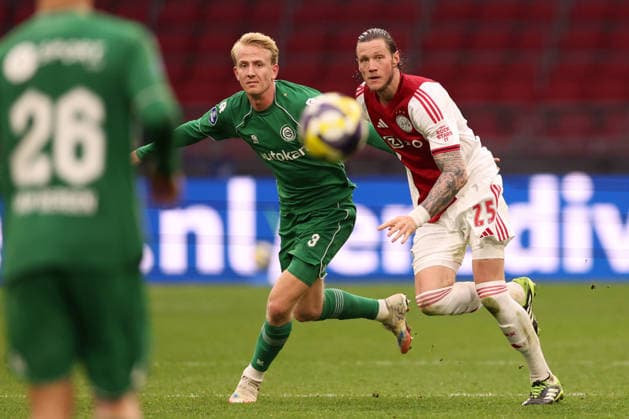 Wout Weghorst of AFC Ajax with Thijmen Blokzijl of FC Groningen during the match AFC Ajax Amsterdam vs FC Groningen at the Johan Cruijff ArenA for the Dutch Vriendenloterij Eredivisie season 2025 2026 in AMSTERDAM, Netherlands on 1 december 2025, photo by Peter Lous EYE4images DeFodi Images