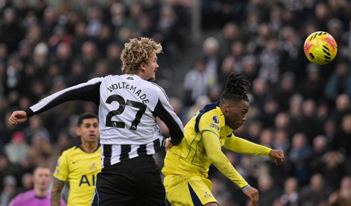 Nick Woltemade of Newcastle United heads at goal as Destiny Udogie of Tottenham Hotspur challenges Newcastle United v Tottenham Hotspur, Premier League, Football, St James Park, Newcastle, UK - 02 Dec 2025Newcastle St James Park United Kingdom EDITORIAL USE ONLY No use with unauthorised audio, video, data, fixture lists, club league logos or live services. Online in-match use limited to 120 images, no video emulation. No use in betting, games or single club league player publications. Copyright: xGreigxCowie Shutterstockx 16005567bb