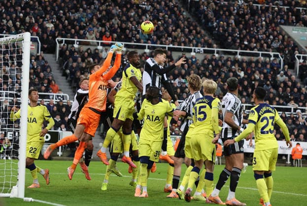 Newcastle Upon Tyne, England, 2nd December 2025. Lewis Miley (C) of Newcastle United heads at goal during the Newcastle United vs Tottenham Hotspur Premier League match at St. James Park, Newcastle Upon Tyne. Picture credit should read: Nigel Roddis Sportimage EDITORIAL USE ONLY. No use with unauthorised audio, video, data, fixture lists, club league logos or live services. Online in-match use limited to 120 images, no video emulation. No use in betting, games or single club league player publications. SPI_032_NR_NEWC_TOTT SPI-4340-0032