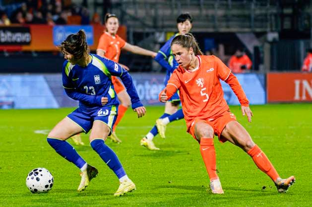 Chaerim Kang of South Korea battles for possession with Marisa Olislagers of The Netherlands Netherlands v South Korea, Women s International Friendly, Länderspiel, Nationalmannschaft Netherlands v South Korea, Mandemakers Stadium, December 2, 2025, Waalwijk, Netherlands.