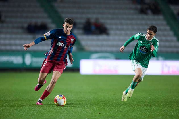 Racing Club Ferrol v SD Huesca - Copa del Rey FERROL, SPAIN - DECEMBER 2: Angel Perez of SD Huesca competes for the ball with Azael Garcia of Racing Club de Ferrol during the Copa del Rey second round match between Racing Club Ferrol and SD Huesca at Campo Municipal A Malata on December 2, 2025 in Ferrol, Spain. (Photo by Diego Simon Photo Players Images Magara Press) Ferrol Estadio Municipal A Malata Spain Copyright: xDiegoxSimonx
