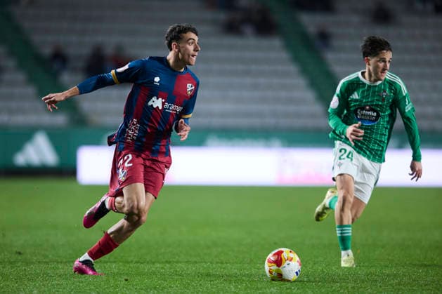 Racing Club Ferrol v SD Huesca - Copa del Rey FERROL, SPAIN - DECEMBER 2: Angel Perez of SD Huesca competes for the ball with Azael Garcia of Racing Club de Ferrol during the Copa del Rey second round match between Racing Club Ferrol and SD Huesca at Campo Municipal A Malata on December 2, 2025 in Ferrol, Spain. (Photo by Diego Simon Photo Players Images Magara Press) Ferrol Estadio Municipal A Malata Spain Copyright: xDiegoxSimonx