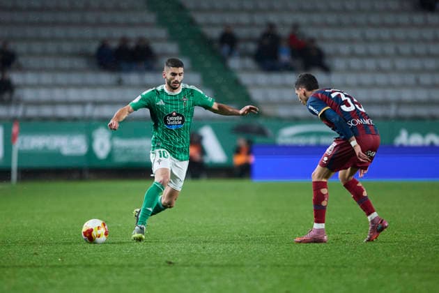 Racing Club Ferrol v SD Huesca - Copa del Rey FERROL, SPAIN - DECEMBER 2: Pascu of Racing Club de Ferrol competes for the ball with Daniel Luna of SD Huesca during the Copa del Rey second round match between Racing Club Ferrol and SD Huesca at Campo Municipal A Malata on December 2, 2025 in Ferrol, Spain. (Photo by Diego Simon Photo Players Images Magara Press) Ferrol Estadio Municipal A Malata Spain Copyright: xDiegoxSimonx