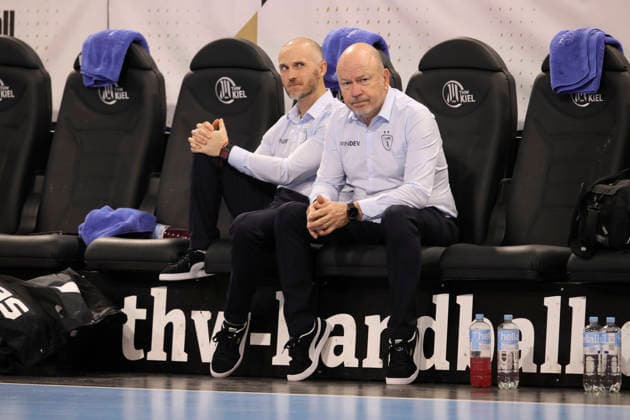 photo smalltalk before kick-off , Physiotherapist Alain Carmand , left next to him Co Coach Baptiste Nicot Handball Men on Tue 02 12 2025 Euroleague Mens EHF EURO LEAGUE , Tue 02 12 25 THW Kiel Montpellier HB