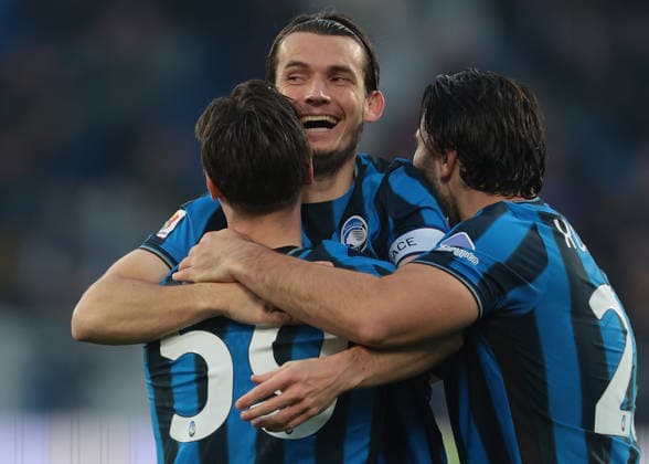 Bergamo, Italy, 3rd December 2025. Marten De Roon of Atalanta celebrates with team mate Nicola Zalewski and Sead Kolasinac after scoring to give the side a 2-0 lead during the Atalanta vs Genoa Coppa Italia match at New Balance Arena, Bergamo. Picture credit should read: Jonathan Moscrop Sportimage EDITORIAL USE ONLY. No use with unauthorised audio, video, data, fixture lists, club league logos or live services. Online in-match use limited to 120 images, no video emulation. No use in betting, games or single club league player publications. SPI_075_JM_ATALANTA_GENOA_CI SPI-4320-0075