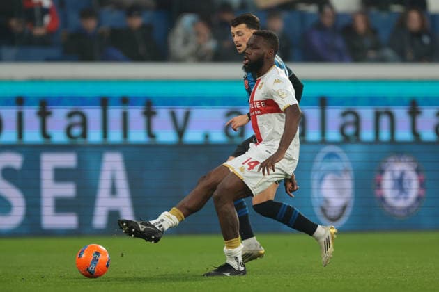 Bergamo, Italy, 3rd December 2025. Jean Onana of Genoa CFC passes the ball as he is pursued by Lazar Samardzic of Atalanta during the Atalanta vs Genoa Coppa Italia match at New Balance Arena, Bergamo. Picture credit should read: Jonathan Moscrop Sportimage EDITORIAL USE ONLY. No use with unauthorised audio, video, data, fixture lists, club league logos or live services. Online in-match use limited to 120 images, no video emulation. No use in betting, games or single club league player publications. SPI_087_JM_ATALANTA_GENOA_CI SPI-4320-0087