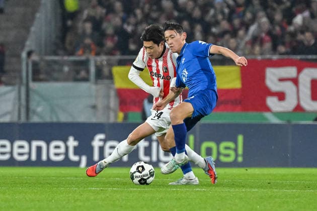 Yuito Suzuki SC Freiburg, 14 , Hiroki Akiyama SV Darmstadt 98, 16 in duel for the ball GER, SC Freiburg SV Darmstadt 98, Football, DFB Pokal, Round of 16, 2025 2026 season, 03 12 2025 DFB REGULATIONS PROHIBIT ANY USE OF PHOTOGRAPHS AS IMAGE SEQUENCES AND OR QUASI VIDEO GER, SC Freiburg SV Darmstadt 98, Football, DFB Pokal, Round of 16, 2025 2026 season, 03 12 2025 Freiburg Copyright: xEibner-Pressefoto ThomasxHessx EP_THS