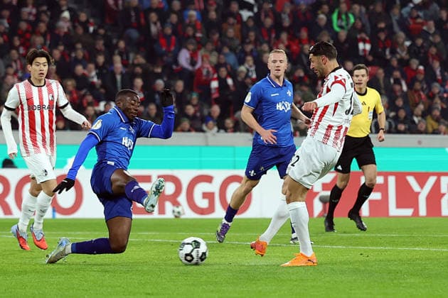 03 12 2025, xrekx, Football DFB Pokal 1 8 Final, SC Freiburg SV Darmstadt 98 v l Merveille Papela SV Darmstadt 98 Vincenzo Grifo SC Freiburg Zweikampf, Aktion, action, battle for the ball DFL DFB REGULATIONS PROHIBIT ANY USE OF PHOTOGRAPHS as IMAGE SEQUENCES and or QUASI VIDEO Freiburg