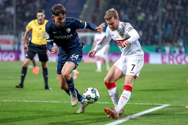 02 12 2025, Football, DFB Cup, Achtelfinale, Season 2025 2026 Cajetan Lenz VfL Bochum 34 in duel against Maximilian Mittelstädt VfB Stuttgart 07 DFB regulations prohibit any use of photographs as image sequences and or quasi video North Rhine-Westphalia Germany