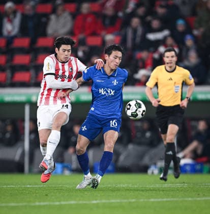 Football DFB Cup round of 16 2025 2026 03 12 2025 SC Freiburg SV Darmstadt 98 Yuito Suzuki left, SC Freiburg v Hiroki Akiyama right, SV Darmstadt 98