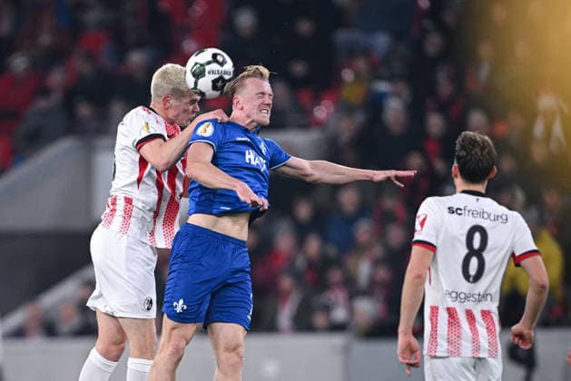 Football DFB Cup round of 16 2025 2026 03 12 2025 SC Freiburg SV Darmstadt 98 Isac Lidberg center, SV Darmstadt 98 vs Matthias Ginter left, SC Freiburg