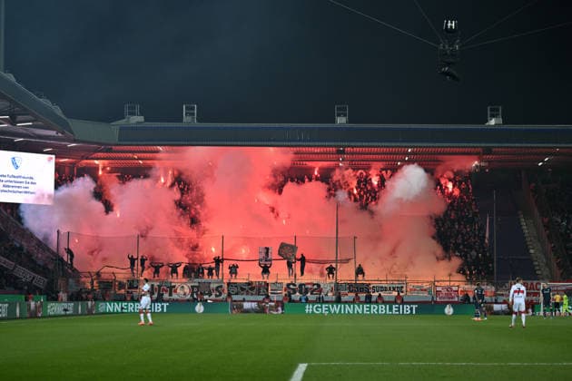 Stuttgart fans set off Bengalos at the start of the second half and caused a delayed kick-off 03 12 2025, Football DFB Pokal, Season 2025 2026, Round of 16, VfL Bochum VfB Stuttgart DFB regulations prohibit any use of photographs as image sequences and or quasi video Bochum Vonovia Ruhrstadion Nordrhein Westfalen Germany Team2