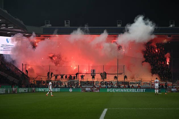 Stuttgart fans set off Bengalos at the start of the second half and caused a delayed kick-off 03 12 2025, Football DFB Pokal, Season 2025 2026, Round of 16, VfL Bochum VfB Stuttgart DFB regulations prohibit any use of photographs as image sequences and or quasi video Bochum Vonovia Ruhrstadion Nordrhein Westfalen Germany Team2