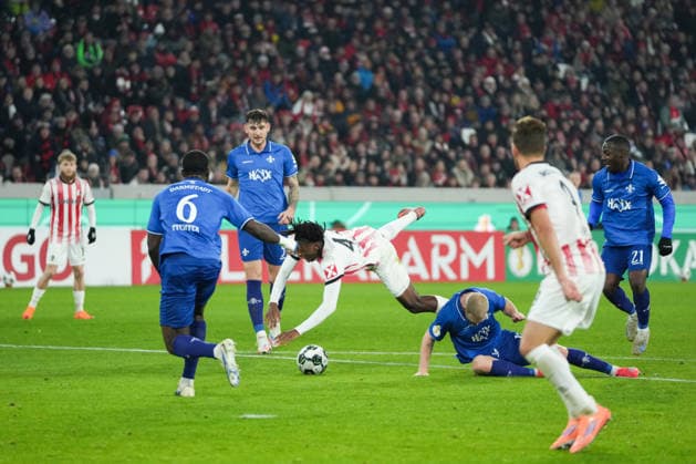 DFB Pokal SC Freiburg vs SV Darmstadt 98, 03 12 2025 Johan Manzambi SC Freiburg, 44 who is brought down by Kai Klefisch SV Darmstadt 98, 17 , which is not whistled as a foul for SC Freiburg DFB Pokal SC Freiburg vs SV Darmstadt 98, Europa Park Stadion, 03 12 2025 DFB DFL REGULATIONS PROHIBIT ANY USE OF PHOTOGRAPHS AS IMAGE SEQUENCES AND OR QUASI VIDEO Copyright: xBEAUTIFULxSPORTS Boscox