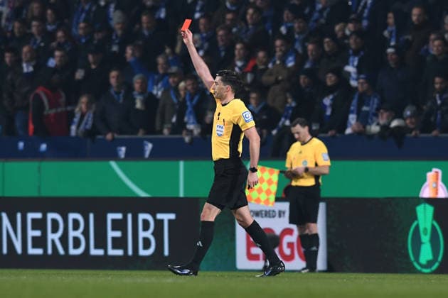 Soccer DFB Cup round of 16 VfL Bochum VfB Stuttgart on 03 12 2025 at Vonovia Ruhrstadion in Bochum Referee Florian Badstübner shows Philipp Strompf Bochum the red card DFB regulations prohibit any use of photographs as image sequences and or quasi video xRx