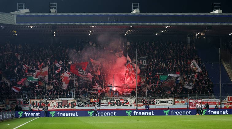 Bochum , DfB Pokal soccer VfL Bochum vs VfB Stuttgart, Stuttgart fan curve with pyrotechnics According to the regulations of the DFL German Football League, it is prohibited to use or have used photographs taken in the stadium and or of the match in the form of sequential images and or video-like photo series