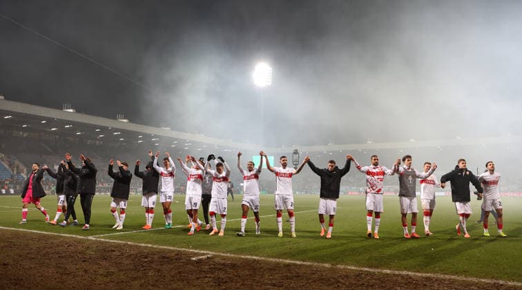Bochum , DfB Pokal soccer VfL Bochum vs VfB Stuttgart, the Stuttgart team celebrates the victory According to the regulations of the DFL German Football League, it is prohibited to use or have used photographs taken in the stadium and or of the match in the form of sequential images and or video-like photo series
