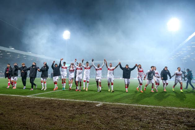 03 12 2025, Football, DFB Cup, VfL Bochum VfB Stuttgart, Round of 16, Vonovia Ruhrstadion, Season 2025 2026 Final cheers after the 2 0 victory for Stuttgartr VFB advances to the quarter-finals The team stands cheering on the pitch DFB regulations prohibit any use of photographs as image sequences and or quasi video North Rhine-Westphalia Germany