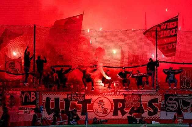 03 12 2025, Football, DFB Cup, VfL Bochum VfB Stuttgart, Round of 16, Vonovia Ruhrstadion, Season 2025 2026 Ultras fans in the visitors block cause the game to be interrupted by the use of pyrotechnics in the visitors block Dense smoke and fog drifts onto the pitch Choreography Choreo Choreography Bengal fire Bengalos Fireworks DFB regulations prohibit any use of photographs as image sequences and or quasi video North Rhine-Westphalia Germany