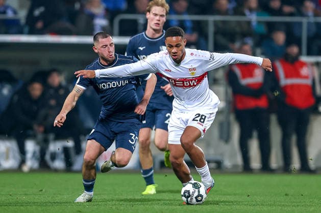 03 12 2025, Football, DFB Cup, VfL Bochum VfB Stuttgart, Round of 16, Vonovia Ruhrstadion, Season 2025 2026 Maximilian Wittek VfL Bochum 32 in duel against Nikolas Nartey VfB Stuttgart 28 DFB regulations prohibit any use of photographs as image sequences and or quasi video North Rhine-Westphalia Germany