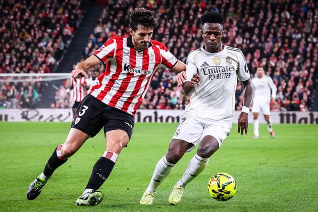 December 3, 2025, Bilbao, Spain, Spain: Dani VIVIAN of Athletic Bilbao and Vinicius Junior (Jr) of Real Madrid during the LaLiga match between Athletic Club and Real Madrid CF at San Mames Stadium on December 03, 2025 in Bilbao, Spain. Marcos Calvo Bilbao Spain - ZUMAm308 20251203_zsp_m308_002 Copyright: xMatthieuxMirvillex