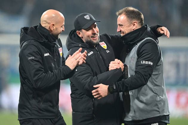 Coach Sebastian HOENESS, Hoeneß S Mitte with co-coaches, final cheer VfB Stuttgart, cheer, cheer, joy, cheers, football, DFB Pokal, Round of 16, Round of 16, VfL Bochum BO VfB Stuttgart S 0 2 am 03 12 2025, Vonovia Ruhrstadion Bochum Germany DFL regulations prohibit any use of photographs as image sequences and or quasi video Â