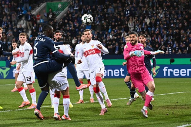 Goalkeeper Fabian BREDLOW S saves a goal chance from Ibrahima SISSOKO BO Action, duel, Football, DFB Pokal, Round of 16, VfL Bochum BO VfB Stuttgart S 0 2 am 03 12 2025, Vonovia Ruhrstadion Bochum Germany DFL regulations prohibit any use of photographs as image sequences and or quasi video Â