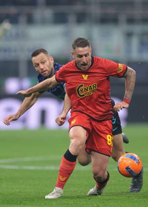 Milan, Italy, 3rd December 2025. Stefan de Vrij of FC Internazionale tussles with Antonio Casas of Venezia FC during the Internazionale vs Venezia Coppa Italia match at Giuseppe Meazza, Milan. Picture credit should read: Jonathan Moscrop Sportimage EDITORIAL USE ONLY. No use with unauthorised audio, video, data, fixture lists, club league logos or live services. Online in-match use limited to 120 images, no video emulation. No use in betting, games or single club league player publications. SPI_008_JM_INTER_VENEZIA_CI SPI-4321-0008