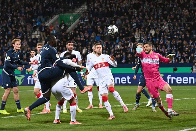 Goalkeeper Fabian BREDLOW S saves a goal chance from Ibrahima SISSOKO BO Action, duel, Football, DFB Pokal, Round of 16, VfL Bochum BO VfB Stuttgart S on 03 12 2025, Vonovia Ruhrstadion Bochum Germany DFL regulations prohibit any use of photographs as image sequences and or quasi video Â
