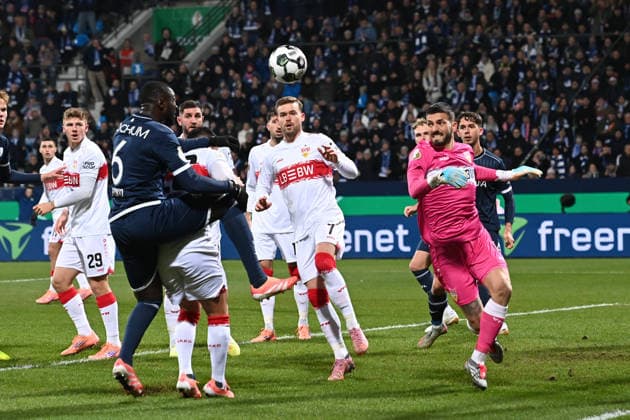 Goalkeeper Fabian BREDLOW S saves a goal chance from Ibrahima SISSOKO BO Action, duel, Football, DFB Pokal, Round of 16, VfL Bochum BO VfB Stuttgart S 0 2 am 03 12 2025, Vonovia Ruhrstadion Bochum Germany DFL regulations prohibit any use of photographs as image sequences and or quasi video Â