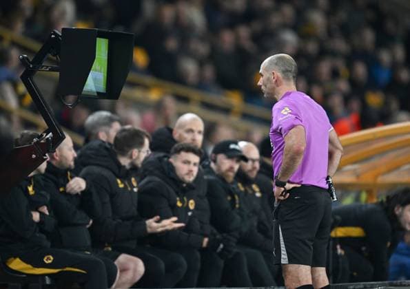 Referee Tim Robinson checks the VAR monitor before ruling out a goal scored by Igor Jesus of Nottingham Forest Wolverhampton Wanderers v Nottingham Forest, Premier League, Football, Molineux, Wolverhampton, UK - 03 Dec 2025Wolverhampton Molineux United Kingdom EDITORIAL USE ONLY No use with unauthorised audio, video, data, fixture lists, club league logos or live services. Online in-match use limited to 120 images, no video emulation. No use in betting, games or single club league player publications. Copyright: xAnnaxGowthorpe Shutterstockx 16006096w