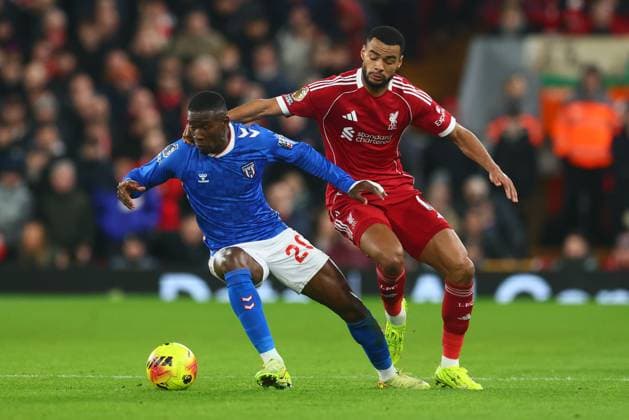 Nordi Mukiele of Sunderland and Cody Gakpo of Liverpool Liverpool v Sunderland, Premier League, Football, Anfield, Liverpool, UK - 03 Dec 2025Liverpool Anfield United Kingdom EDITORIAL USE ONLY No use with unauthorised audio, video, data, fixture lists, club league logos or live services. Online in-match use limited to 120 images, no video emulation. No use in betting, games or single club league player publications.  Copyright: xPaulxCurrie Shutterstockx 16006099bz