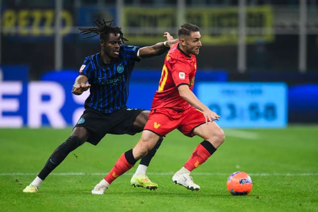 FC Internazionale v Venezia FC - Coppa Italia Antonio Casas of Venezia FC competes for the ball with Yann Bisseck of FC Internazionale during the Coppa Italia football match between FC Internazionale and Venezia FC. Milan Italy Copyright: xNicolòxCampox
