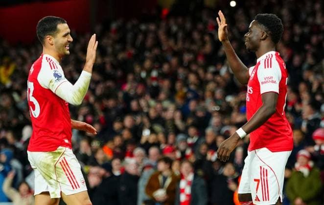 Bukayo Saka of Arsenal celebrates scoring a goal after making it 2-0 with fellow scorer Mikel Merino Arsenal v Brentford, Premier League, Football, Emirates Stadium, London, UK - 03 Dec 2025London Emirates Stadium United Kingdom EDITORIAL USE ONLY No use with unauthorised audio, video, data, fixture lists, club league logos or live services. Online in-match use limited to 120 images, no video emulation. No use in betting, games or single club league player publications.  Copyright: xJavierxGarcia Shutterstockx 16006081ag